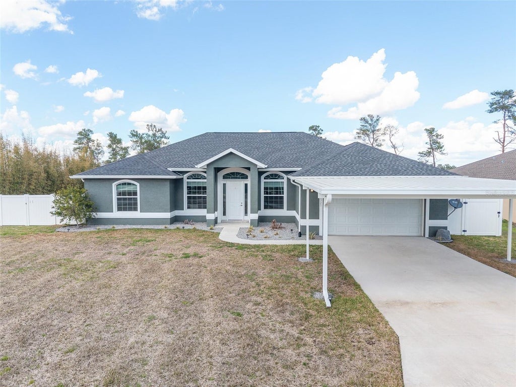 Photo of 4321 SW 106th Place, Ocala, FL 34476 (MLS # OM729987)