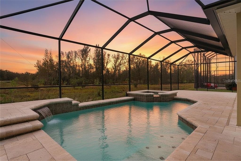 Photo of 32450 Talimena Loop, Wesley Chapel, FL 33543 (MLS # TB8463204)