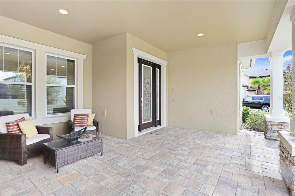 Photo of 32450 Talimena Loop, Wesley Chapel, FL 33543 (MLS # TB8463204)