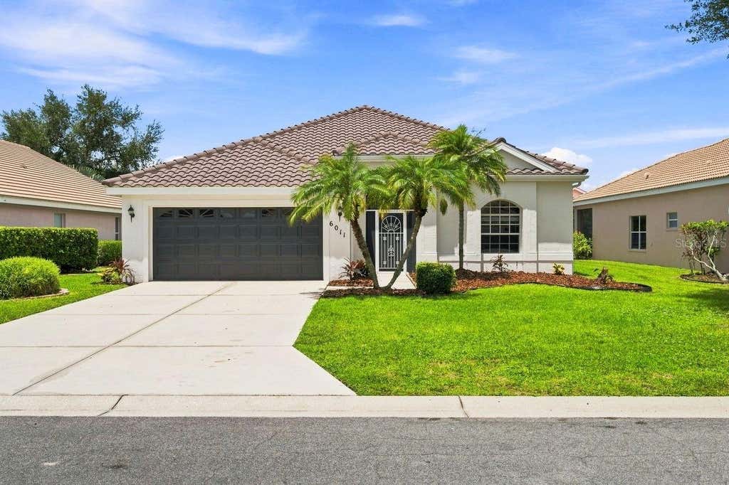Photo of 6011 Chaparral Avenue, Sarasota, FL 34243 (MLS # A4702439)