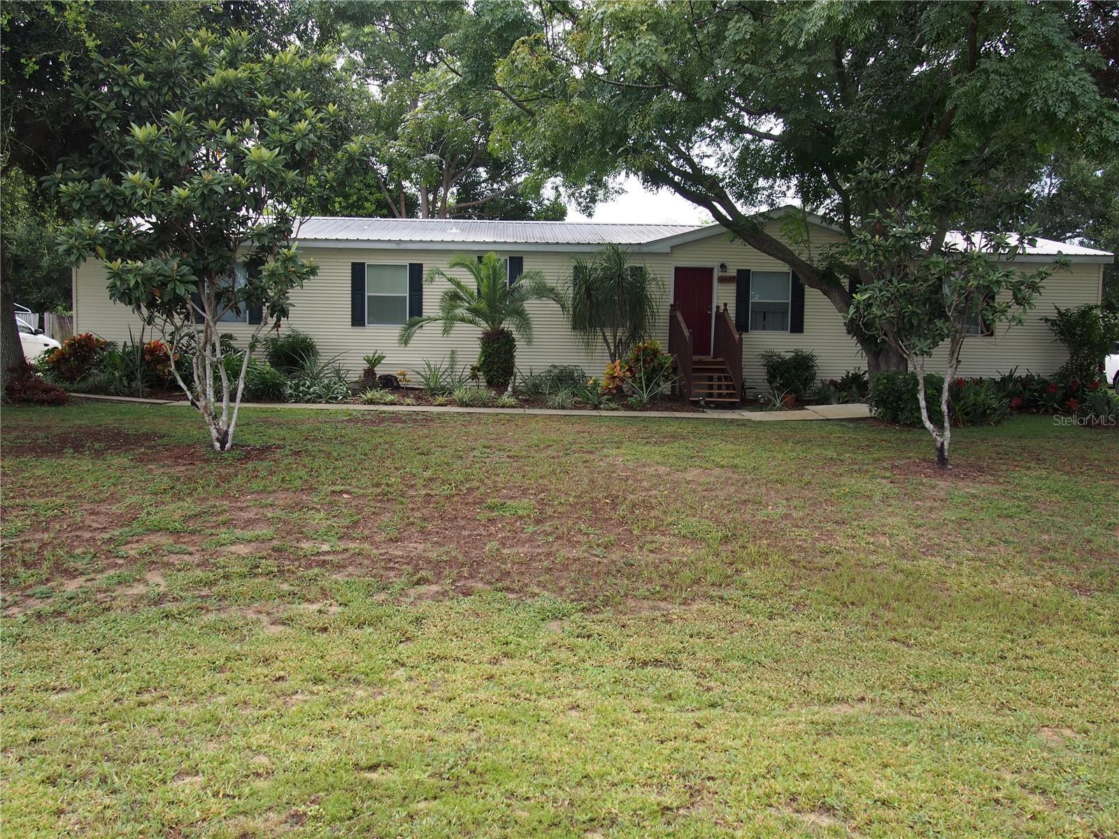 Welcome home to this spacious 4-bedroom, 3-bathroom property full of comfort and charm. The split floor plan places the master suite and office on one side of the home, while the other three bedrooms are on the opposite end. One bedroom has its own access to a hall bath, and the other two share a convenient Jack-and-Jill bathroom. The open kitchen flows into the family room, complete with a cozy fireplace—perfect for gatherings. The master suite features dual sinks, a relaxing garden tub, and a separate shower.
Step outside to enjoy the mature landscaping, including fruit trees that bring beauty and shade throughout the seasons. The generous 0.29-acre lot offers plenty of room for outdoor activities, and two storage sheds add even more convenience. With thoughtful updates and an affordable HOA, this home is ready to welcome its new owners.