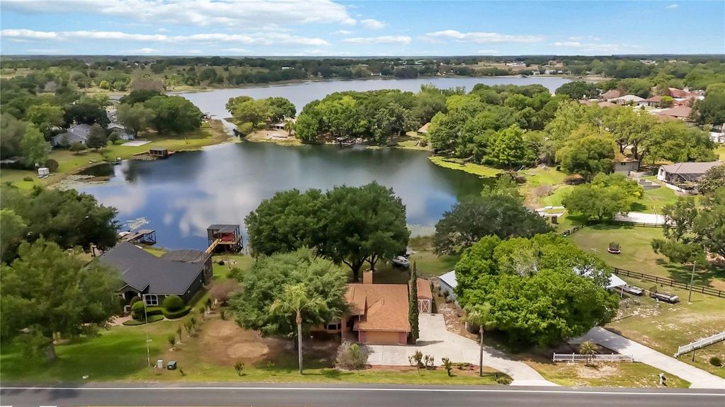 Photo of 9835 Lakeshore Drive, Clermont, FL 34711 (MLS # O6398144)