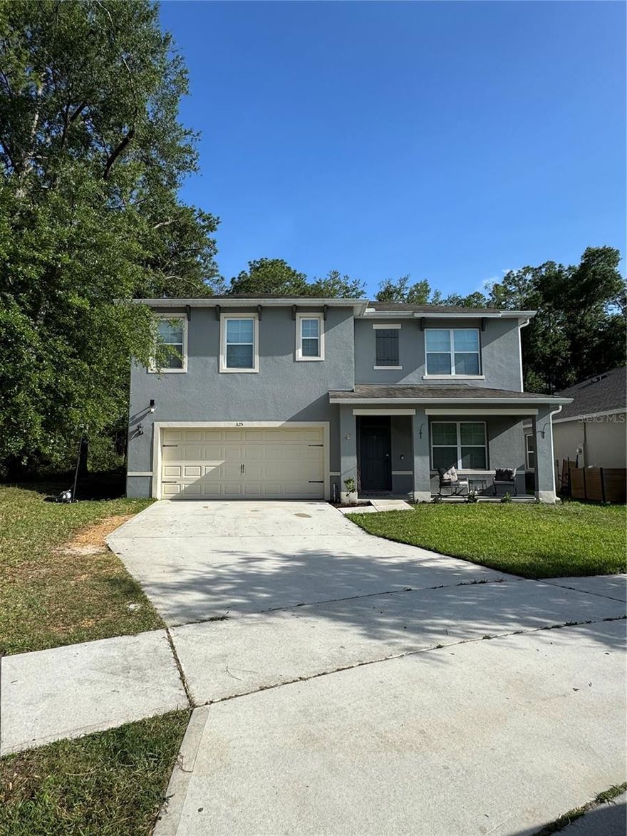 This spacious 5-bedroom, 3-bathroom Hayden model by D.R. Horton offers the perfect blend of thoughtful upgrades, natural serenity, and resort-style living — all in one of DeLand's most sought-after communities.

The flexible layout is one of this home's standout features. The main floor includes a private guest bedroom and full bath — ideal for in-laws or visitors — along with a bonus room perfectly suited as a home office or formal dining room. The heart of the home is the open-concept family room and kitchen, where a large island with seating invites conversation and connection — whether you're hosting a dinner party or enjoying a casual morning with family. The kitchen shines with beautiful quartz countertops, and the same premium stone carries through to all three bathrooms.

Head upstairs and you'll find a generous loft space that works beautifully as a media room or second living area, plus the convenience of an upstairs laundry room that makes everyday life that much easier. The large primary bedroom features an en-suite bathroom with a walk-in shower, separate water closet and dual vanity. Three additional bedrooms provide even more space for sleeping or hobby rooms. A third bathroom features another double vanity and tub shower.

Out back, your extended patio is the perfect place to unwind — and with an fenced yard backing directly to a peaceful nature zone, you'll enjoy true privacy and the daily delight of songbirds and local wildlife visiting your backyard. No rear neighbors, and only one neighbor to the side means this lot offers rare tranquility within a community setting. Gutters have been added for worry-free maintenance, and the garage features a dedicated workspace for the hobbyist or home handyman. Smart outlets and smart lighting throughout the home add modern convenience at your fingertips, while a whole-home water softener ensures quality water from every tap.

Life in Victoria Oaks comes with exceptional perks. Residents enjoy access to the neighborhood's own pool and amenity center, plus full access to the Victoria Park amenities — multiple pools, fitness facilities, tennis courts, and scenic walking trails. A nearby golf course rounds out the outdoor lifestyle perfectly.

When you're ready to venture out, you're just minutes from shopping, dining, and the charming boutiques and restaurants of Historic Downtown DeLand — one of Florida's most beloved small cities. Quick I-4 access puts Orlando, Daytona Beach, and the coast all within easy reach. This is Florida living at its finest — upgraded, private, and perfectly located.