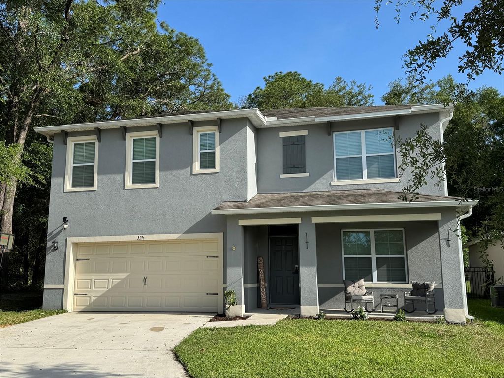 Photo of 325 Charles Drive, Deland, FL 32724 (MLS # O6409581)