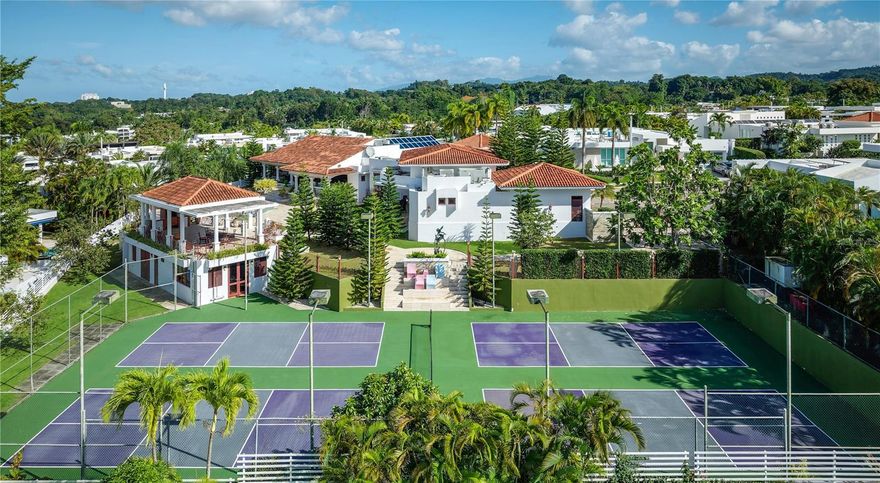 ***UNDER CONTRACT*** Elegantly positioned within the private enclave of Paseo Alto in Los Paseos, 95-96 Mirador Street spans an expansive double lot encompassing just under an acre of land. This Mediterranean-style estate stands as one of the largest private residential offerings in the community, with over 9,600 square feet of living and leisure space, thoughtfully designed for large-scale living and entertaining with privacy and presence. The main residence features approximately 8,065 interior square feet arranged across multiple wings, including 6 bedrooms, 6 full bathrooms, 3 half bathrooms, formal and informal living areas, a study, music room, and a sunlit breakfast nook. A skylit colonnade anchors the center of the home, connecting grand entertaining spaces with more intimate quarters. A detached 1-bed, 1-bath casita with gym, upper-level terrace, and covered summer kitchen add further dimension to the layout, offering flexible use for wellness, recreation, and hosting. Outdoor spaces are equally commanding. A resort-style pool is surrounded by manicured grounds, shaded patios, and an expansive BBQ pavilion. The estate also includes a private sports complex with four pickleball courts, a rare amenity that elevates both everyday living and entertaining. This is a rare opportunity to own a legacy estate with extraordinary scale, versatility, and architectural presence, offered in one of San Juan’s most discreet residential enclaves.