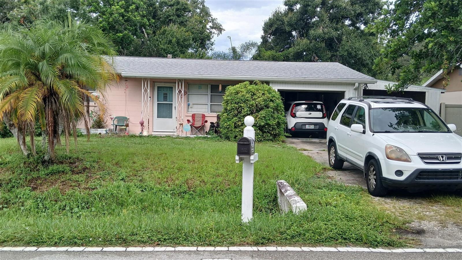 Solid CBS 2-bedroom, 1-bath home in a desirable Sarasota location, featuring 831 sq ft under air on a spacious 7,561 sq ft lot with a 1-car garage. Major updates have already been completed, including a roof installed just 18 months ago, upgraded electrical service, and newer water heater. Plumbing is in great condition. Cooling is currently provided by a window unit.
The kitchen, bathroom, and flooring are original and ready for your personal touch—
Located close to shopping, dining, parks, and just a short drive to Sarasota’s beautiful beaches, this property combines convenience and opportunity. Whether you’re creating your dream home or a profitable investment, 3226 Belmont Blvd is ready for transformation
This home will not last!