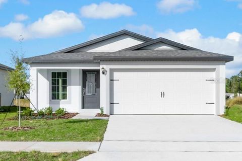Photo of 13307 Tula Loop, Astatula, FL 34705 (MLS # TB8415319)
