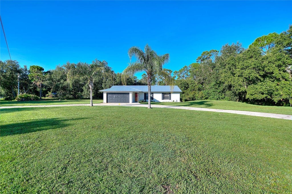 Photo of 2501 Plumosa Drive, Indian Lake Estates, FL 33855 (MLS # S5157149)