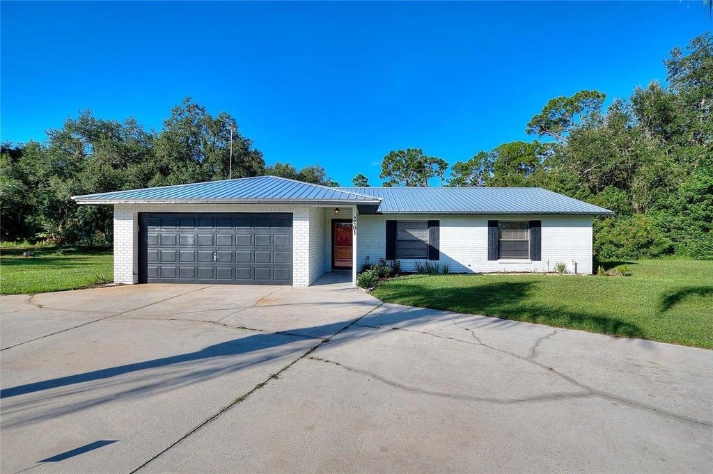 Photo of 2501 Plumosa Drive, Indian Lake Estates, FL 33855 (MLS # S5157149)