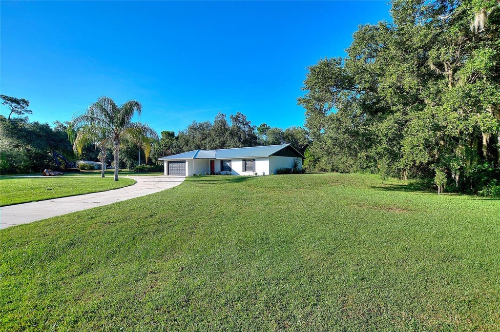 Photo of 2501 Plumosa Drive, Indian Lake Estates, FL 33855 (MLS # S5157149)