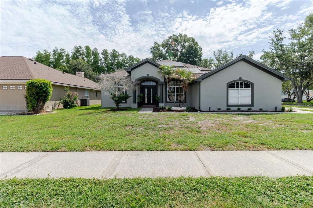 Photo of 9601 Regents Park Drive, Tampa, FL 33647 (MLS # TB8517604)