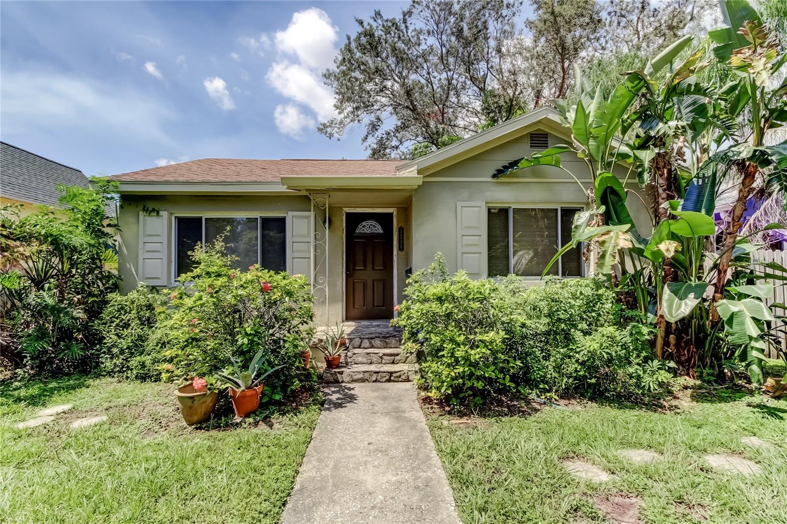 Opportunity knocks in the heart of desirable Euclid St. Paul! This 3-bedroom, 2-bath home offers 1,338 sq ft of potential, sitting high and dry in Flood Zone X—no flood insurance required. Featuring original hardwood floors, a split-bedroom layout, and abundant natural light, cove ceilings and arched doorways, it’s ready for your personal touches or could be the perfect canvas for a complete rebuild. This home is being sold AS-IS with the right to inspect. Enjoy tree-lined streets, charming architecture, and a prime location just minutes from Crescent Lake, downtown St. Pete, I-275, and Gulf Coast beaches. Whether you’re looking to renovate, invest, or build new, this property offers a rare chance to create your dream home in one of St. Pete’s most sought-after neighborhoods.