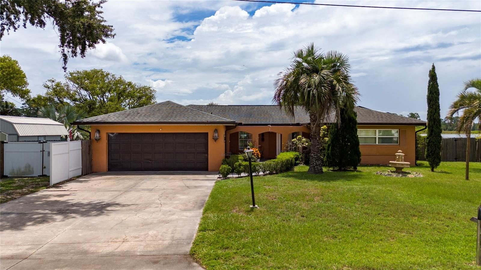 Lakefront 3BR Pool Home | No HOA | Solar Paid Off
Discover this beautifully updated 3-bed, 2-bath lakefront home with a resort-style pool, nearly 2,000 sqft of space, and an unbeatable .34-acre lot in a no-HOA neighborhood. The paid-off solar panels (8 yrs old) major savings.
Inside:
* Open layout with tile floors throughout
*Gourmet kitchen with granite, island, and SS appliances
* Formal dining + game room with full pool views
*Stylish bathrooms with walk-in tile showers
* Split bedroom plan with spacious closets
Outside:
* Custom pool and waterfall feature
* Large paver deck with hammocks, benches, and dock access
* Fully fenced yard with tropical landscaping
* Covered entry, storage sheds, and privacy galore
Built in 1969, renovated in 2015 — this home blends charm with modern comfort. Schedule your showing today!