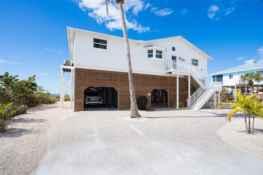 Stunning Gulf and beach views from this beautiful 3 bedroom,3 bath home on Don Pedro-Knight-Palm Island!  Home is in pristine condition and well maintained.  Kitchen has wood cabinets, quartz counters, a pantry with pull out shelves and stainless steel LG appliances.  Plantation shutters and pull shades, with ceramic tile floors throughout.  The elevator opens on the deck. Home being sold furnished. The great room which includes the dining, kitchen and living areas opens to a deck the width of the house that overlooks the beach and the Gulf, one side is screened and the other is open.  Perfect for entertaining or just watching the glorious sunsets. Don Pedro-Knight-Palm Island is situated between Sarasota/Tampa to the north and Ft. Myers/Naples to the south. Accessible only via private boat or a 4 minute car passenger ferry.  Enjoy your island getaway with collecting shells and shark's teeth on the beach, swimming, snorkeling, boating, kayaking, fishing, paddle boarding and much more.  Sale includes a deeded dock across the road on Bocilla Lagoon.  See parcel ID 412033154005 on the Charlotte County tax website.  Buy your piece of island paradise today!!!