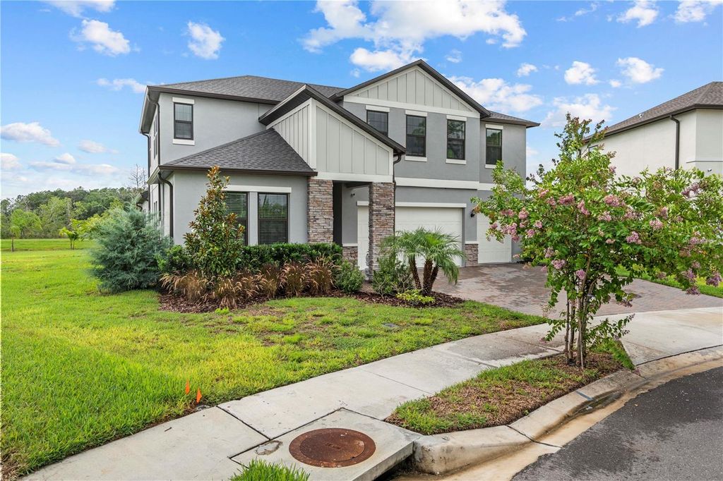 Photo of 22034 Storybook Cabin Way, Land O Lakes, FL 34637 (MLS # TB8404043)