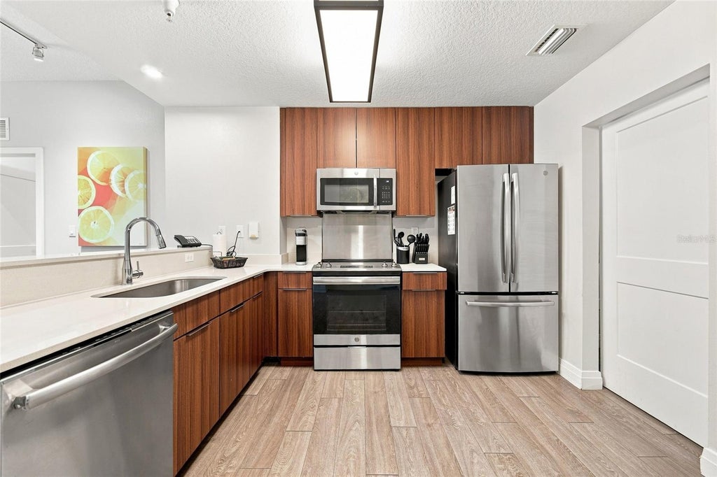 Photo of 14501 Grove Resort Ave #2304, Winter Garden, FL 34787 (MLS # O6447002)