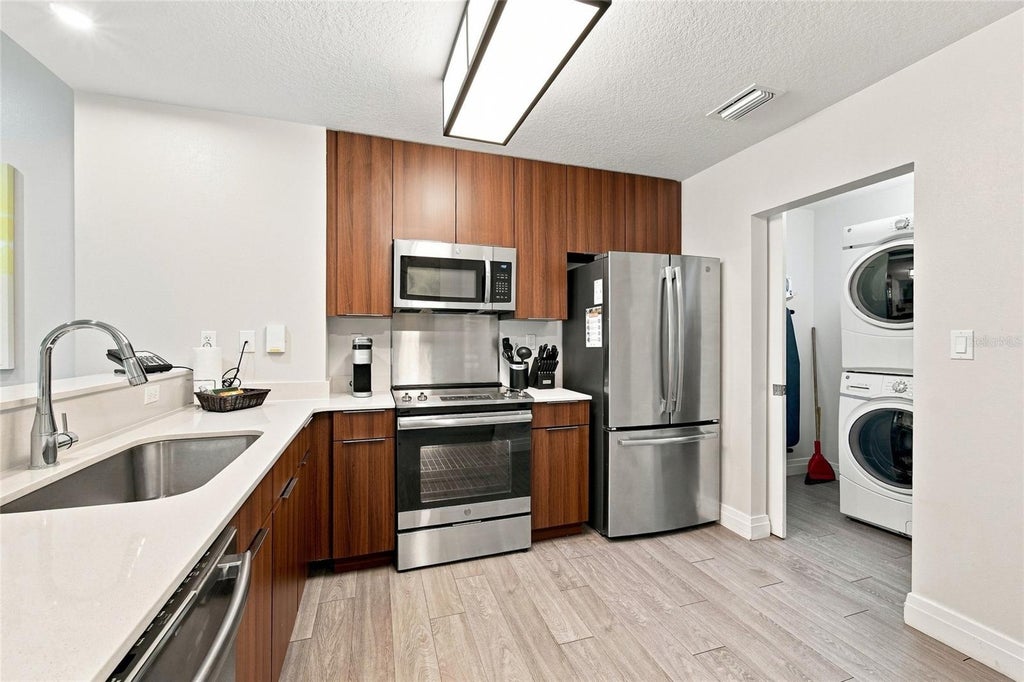 Photo of 14501 Grove Resort Ave #2304, Winter Garden, FL 34787 (MLS # O6447002)