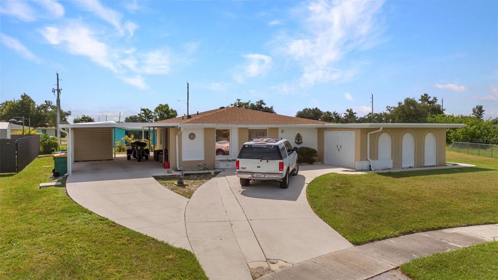 Photo of 1656 Harmony Drive, Port Charlotte, FL 33952 (MLS # C7505084)