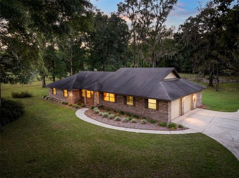 Photo of 11606 NW 120th Terrace, Alachua, FL 32615 (MLS # GC535010)