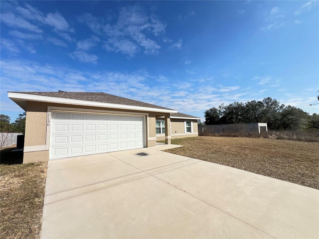Photo of 17150 SW 39th Circle, Ocala, FL 34473 (MLS # O6388944)