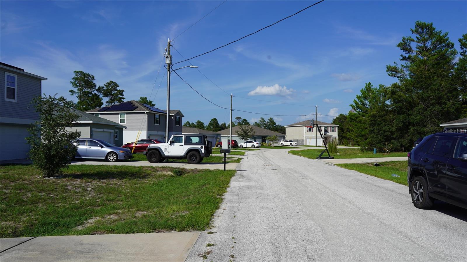 Welcome to this beautiful home located at 224 Gladiola Ct in Kissimmee. This charming residential LOT is in the Poinciana Village, Kissimmee FL JUST 30 MILES FROM DISNEY WORLD. Lot is buildable immediately as all the large trees are cut and removed so you SAVE huge on tree cutting and hauling. All utilities such as power, pubic water, sewage, cable, garbage pickup, road network are in place. Fast developing lot of homes around the lot are all built. Very few lots left, so hurry and make this yours.
