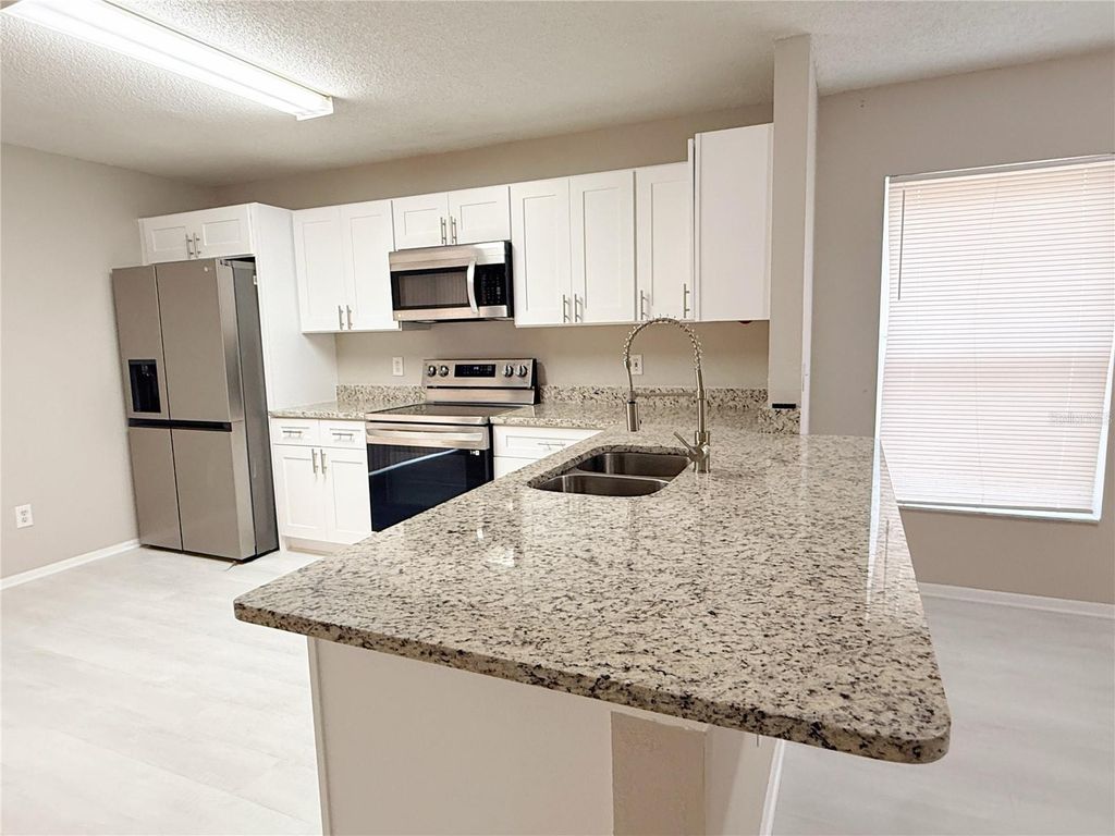 Photo of 4417 Ribblesdale Lane, Orlando, FL 32808 (MLS # S5148812)