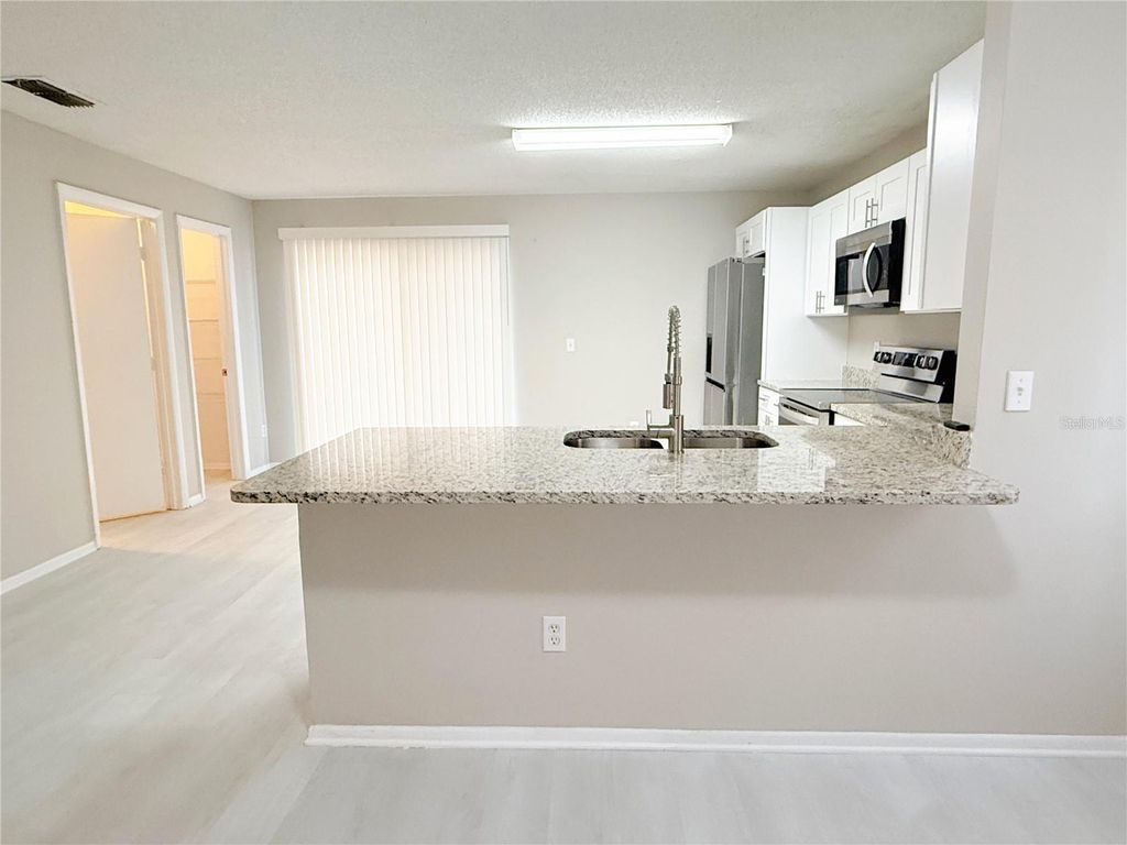 Photo of 4417 Ribblesdale Lane, Orlando, FL 32808 (MLS # S5148812)