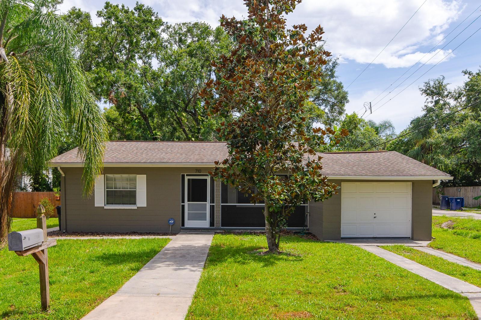 Welcome to this beautifully restored 2-bedroom, 1-bathroom 1947 ranch style home, where timeless charm meets modern upgrades in one of Tampa’s most vibrant and convenient neighborhoods. Just minutes from downtown, Old Seminole Heights, Armature Works, and I-275, this home offers easy access to the city’s best dining, entertainment, and commuter routes, while still retaining the warmth and character of a classic bungalow.
The entire interior was thoughtfully renovated in 2023, featuring a brand-new kitchen with stylish cabinets, an island with Olympia Quartz White Carrara countertops, and an L-shaped Steel Gray Leathered finish with an elegant 3-inch mitered edge. The bathroom was also completely redone, showcasing modern finishes, new tile, and durable Durorock in the shower. New engineered vinyl flooring runs throughout the home, complemented by updated baseboards and fresh drywall installed on all exterior walls. Every major system has been updated, including all new plumbing using PVC and PEX under permit, and new electrical in the kitchen, bathroom, and dining room.
This home also includes upgraded insulation in the attic and between the main living areas to enhance energy efficiency and reduce noise, all completed to meet 2023 energy calculation standards. Additional insulation has been added in both bedrooms, and extra truss strapping provides added peace of mind. The roof was replaced in 2019, and the A/C system, installed in 2020, is currently under a maintenance agreement. The exterior of the home was freshly painted in 2023, giving it great curb appeal and a clean, modern look.
Situated in a walkable neighborhood filled with local favorites, you’re just 0.7 miles from Zoo Tampa at Lowry Park and within easy reach of destinations like Busch Gardens (5.3 miles) and USF (7 miles). Local gems such as Bamboozle, Magnanimous Brewing, Bo's Ice Cream, Soul de Cuba, Trip’s Diner, and C. 1949 are all just steps away.
Whether you’re seeking the perfect starter home, a stylish downsizing option, or an incredible investment, this fully updated home offers everything you need to enjoy the best of Tampa living. Don’t miss your chance to own this Florida dream home!