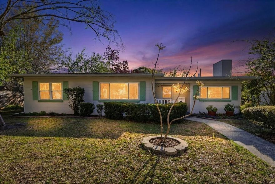 Welcome to this charming three-bedroom, two-bathroom single-family home located in the desirable Pinehurst community in the heart of Sanford. Offering 1,645 square feet of comfortable living space, plus a covered and enclosed back patio and a spacious backyard, this home features a thoughtfully designed layout ideal for both everyday living and entertaining.

Upon entry, you are welcomed into the large living area, highlighted by a stunning wood-burning fireplace that creates a warm and inviting focal point. To the left, a separate formal dining room connects conveniently to the kitchen, making it perfect for hosting family meals or gatherings. The kitchen offers a full appliance package along with ample cabinetry to accommodate all your storage and cooking needs.

Just beyond the dining room, a hallway leads to two additional bedrooms and a well-appointed guest bathroom. The home features a desirable split-bedroom floor plan, with the primary suite located on the opposite side of the home toward the back, providing added privacy. The primary bedroom includes dual closets, offering plenty of storage and organization.

Adjacent to the primary suite is a versatile bonus space that can be used as a home office, sitting area, library or hobby room. Across from the primary suite, you will find a spacious interior laundry room, adding everyday convenience.

From the bonus room, French doors open to the covered and enclosed patio, creating additional living and entertaining space. Beyond the patio, the backyard offers a peaceful outdoor retreat with a walkway leading to a storage shed—perfect for your outdoor equipment and tools. The yard also features a variety of beautiful, well-maintained trees and a private outdoor fireplace, ideal for enjoying cozy evenings outside.

Additional highlights include luxury vinyl flooring throughout the main living areas, high-quality ceramic tile in the kitchen and guest bathroom, multiple extra closets for storage, and a convenient carport. Major System Updates include: Roofing (2023); Electrical Upgrades (2024/2026); HVAC System Upgraded to a Trane (2014); Mini-splits in primary bedroom and laundry room (2024); New South Windows - double paned, double hung, energy saving (2014). 

Ideally located near Lake Monroe and just minutes from Historic Downtown Sanford, you can enjoy a vibrant local lifestyle with a variety of restaurants, boutique shopping, breweries, waterfront parks, farmers markets, and year-round community events and entertainment right nearby. The home also offers convenient access to major highways I-4 and SR-417, making travel to Orlando, Orlando International Airport, world-famous theme parks, and Florida’s beautiful beaches quick and convenient. 

Whether you are a first-time homebuyer or searching for a great investment opportunity, this home truly checks all the boxes. Come see why you’ll love calling this place home!