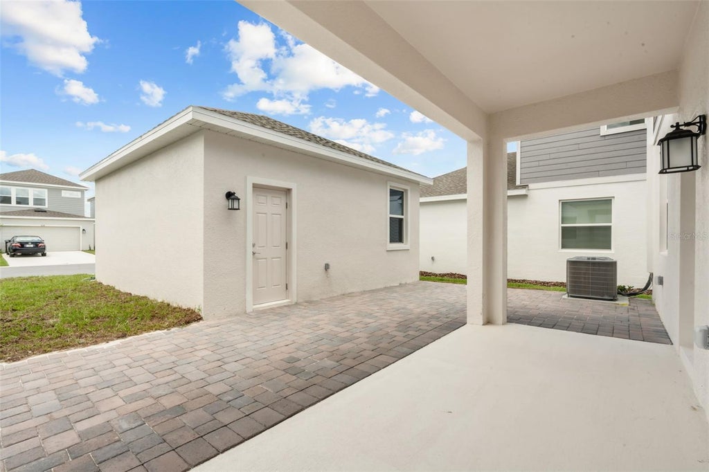 Photo of 6053 Meditation Drive, Clermont, FL 34714 (MLS # O6438032)