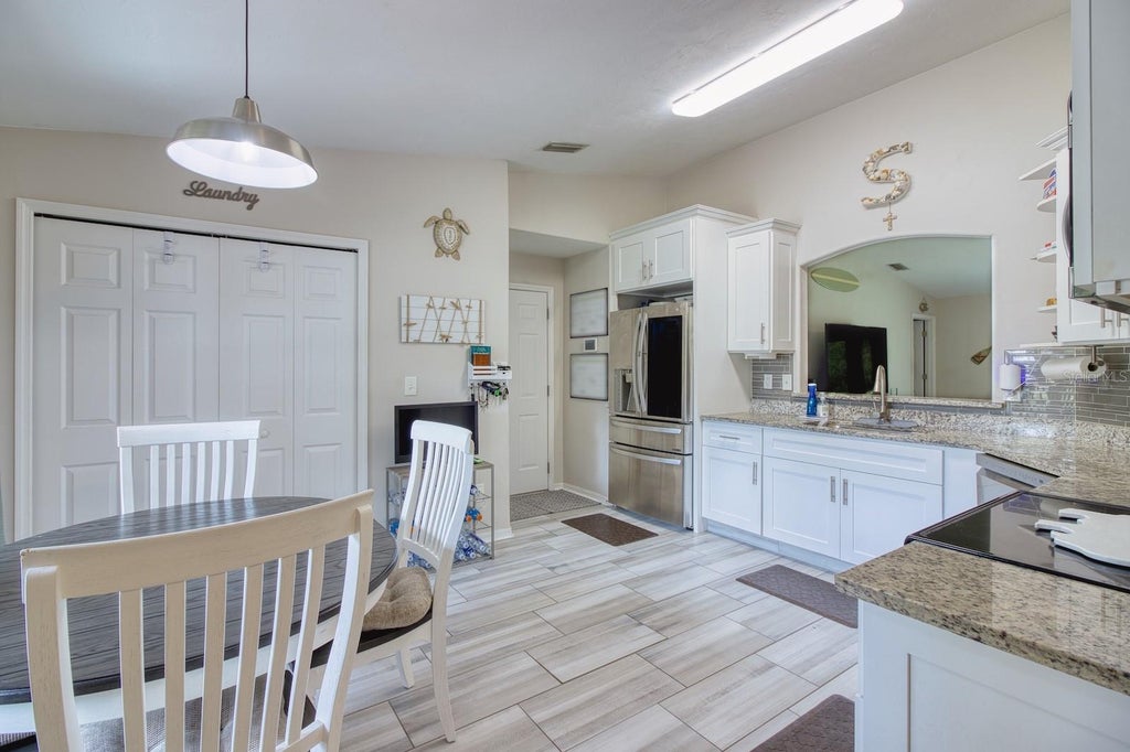 Photo of 27 Sounders Trail Circle, Ormond Beach, FL 32174 (MLS # NS1089435)