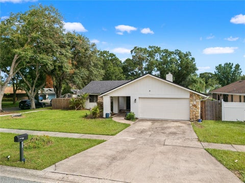 Photo of 1829 Crownwood Drive, Orlando, FL 32810 (MLS # O6424310)