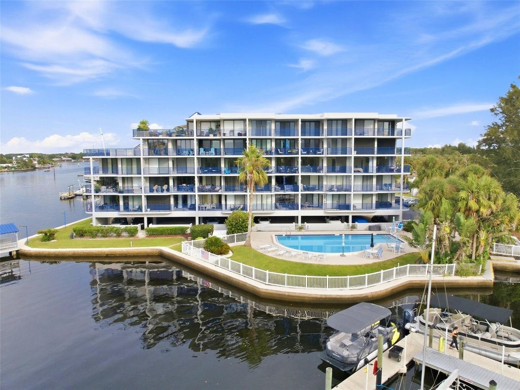 Photo of 4823 Ebbtide Lane #404, Port Richey, FL 34668 (MLS # W7889525)