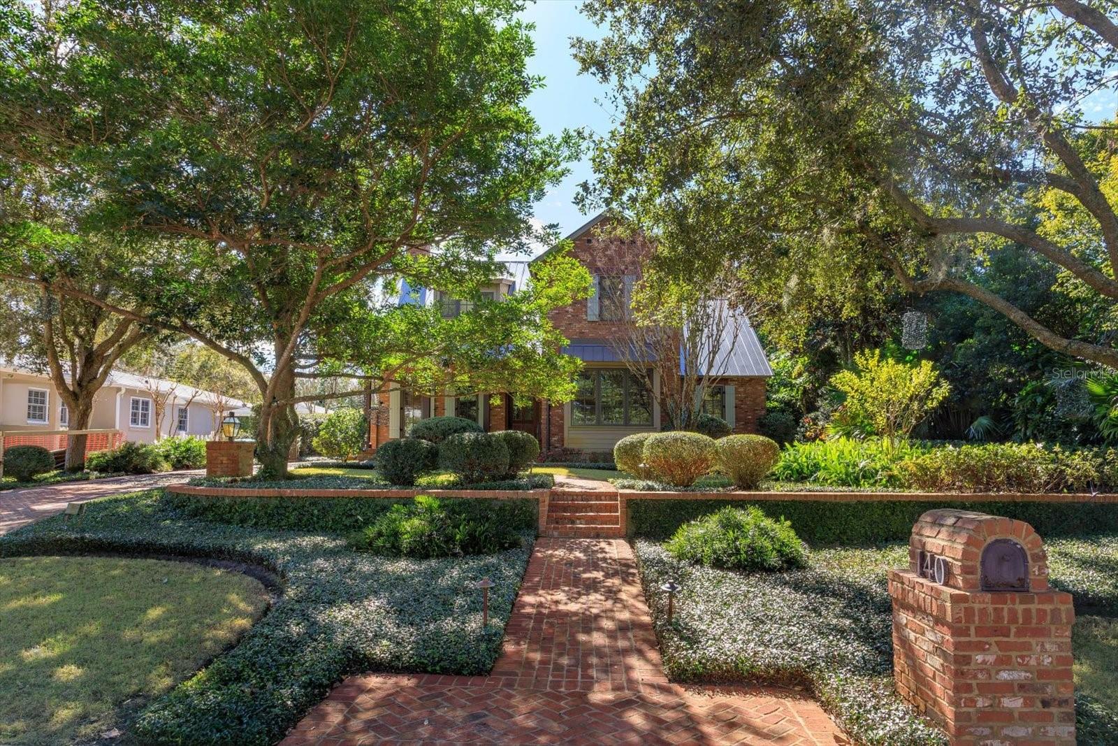 Elegant French Country Estate in Prestigious Winter ParkNestled in the heart of Winter Park’s picturesque, tree-lined streets near Lake Sue, this exquisite French Country estate blends timeless elegance with modern luxury. Situated on an oversized, gated lot, this stunning home offers privacy, sophistication, and an unparalleled living experience.The expansive primary suite, located on the first floor, is a private retreat with spa-like amenities. The open-concept living and dining areas flow seamlessly into the gourmet kitchen, complete with top-of-the-line gas appliances, custom cabinetry, and a separate catering kitchen—ideal for entertaining. The sun-drenched Florida room, surrounded by floor-to-ceiling windows and French doors, provides breathtaking views of the serene private patio and courtyard.A separate office/den on the first floor offers the perfect work-from-home space, while an elevator leads to the second-floor loft-style living area, two additional bedrooms, and a well-appointed Jack-and-Jill bathroom.The detached three-car garage provides ample storage and the opportunity to add a mother-in-law suite above, making this estate both functional and future-ready. The gated driveway and fully fenced property ensure security and exclusivity, all within one of Winter Park’s most sought-after neighborhoods.This is a rare opportunity to own a luxurious estate in a prestigious Winter Park location, surrounded by the beauty of the Lake Sue neighborhodd and just moments from the best shopping, dining, and cultural experiences the area has to offer.