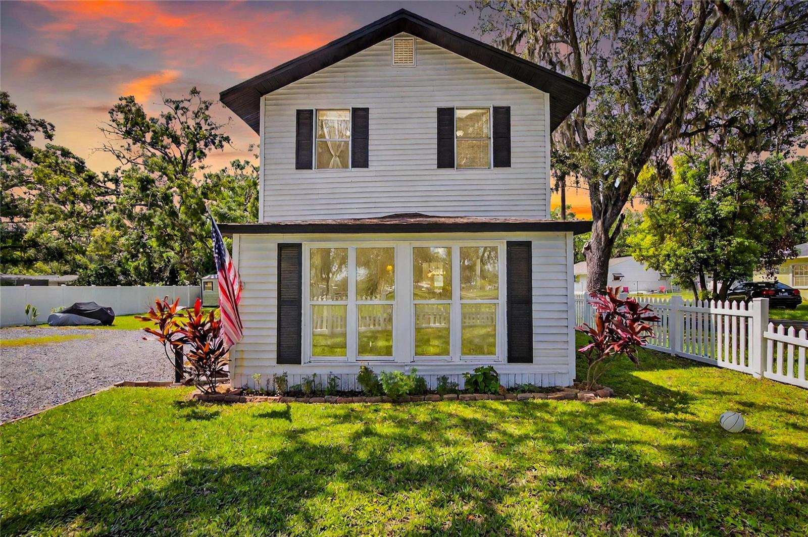 Charming & Adorable Describes this Home! Classic Style Home with All the Modern Updates! This 3 Bedroom 1.5 Bathrooms is located a Short Distance from Historical Downtown Plant City and in Walking Distance from the Strawberry Festival Grounds. Home is located on a Corner Lot, completely fenced and has a Sliding Gate for Entrance. Once you Enter inside this Home You will be Greeted by the Abundance of Natural Light. The Home is Tasteful Updated and Boast Luxury Vinyl Floors, Newer Carpet, High Ceilings, 5 inch Baseboards and Modern Fixtures. The Living and Dining Room has an Open Concept area for Entertaining. The Large Eat-in Kitchen has all the Updates such as Granite Countertops, White Cabinets and Staninless appliances. Upstairs you will find Three Bedrooms and a Shared Bathroom. The Primary Bedroom is of Ample Size for a King Size Bed and allows room for a Sitting Area. Step Outside to Your Fully Fenced Yard, So Much Space for you to Decide how to use. Conveniently situated Near I4 and Close to Shopping and Restaurants that Plant City Offers. Peace of Mind with this Home with all the Major components already done. Roof is under 8 yrs old, AC 2022/2023, Hot Water Heater 2022, Plumbing Redone in 2022, Appliances throughout are less than 5 Yrs old.