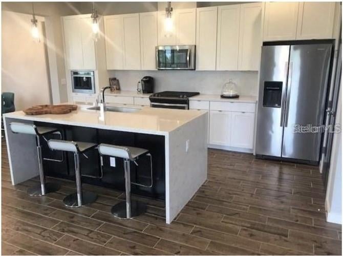 Photo of 15349 Shonan Gold Drive, Winter Garden, FL 34787 (MLS # O6425756)