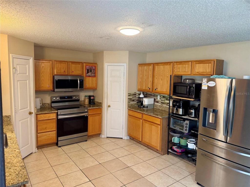 Photo of 510 Lobelia Drive, Davenport, FL 33837 (MLS # O6409101)
