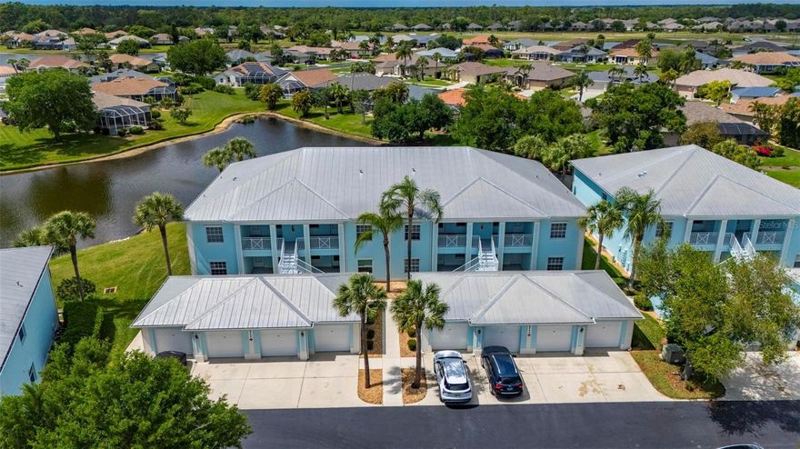 Experience the pinnacle of maintenance-free living in this stunning, updated end-unit located in the gated enclave of The Colony at Sabal Trace. This move-in-ready home boasts a sophisticated, "clean-line" aesthetic with luxury vinyl plank and tile flooring throughout, perfectly framing the serene lake views visible from multiple rooms. The intelligent split-bedroom floor plan prioritizes privacy, featuring a guest suite at the front, a versatile central den, and a secluded primary retreat at the rear.

The heart of the home is an expansive open-concept living area and a gourmet kitchen equipped with granite countertops, a walk-in pantry, and a charming breakfast nook. Whether you are hosting friends at the breakfast bar or enjoying a quiet evening on the screened-in lanai, the seamless flow between indoor and outdoor spaces makes entertaining a breeze. Complete with a private single-car garage and access to premier community amenities—including a resort-style pool, fitness center, and clubhouse—this lakeside gem offers an unmatched blend of luxury and comfort.