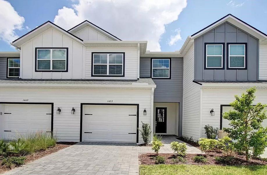 This beautiful, new luxury townhome is located in a gated community. Brentwood Landing Townhomes are located near Highway 417, downtown Winter Park, UCF, Siemens, and various shopping and dining options. This home features 3 bedrooms and 2 1/2 baths and an upstairs loft. The spacious and bright kitchen boasts 42 inch cabinets, quartz countertops, stainless steel appliances, a closet pantry, and an island with a seating area, making it perfect for entertaining guests. The kitchen opens into a large family room with 10 foot ceilings, creating an open and inviting space. Additionally, the townhome includes a beautiful outside lanai for outdoor entertainment. This community also has a community pool and cabana.