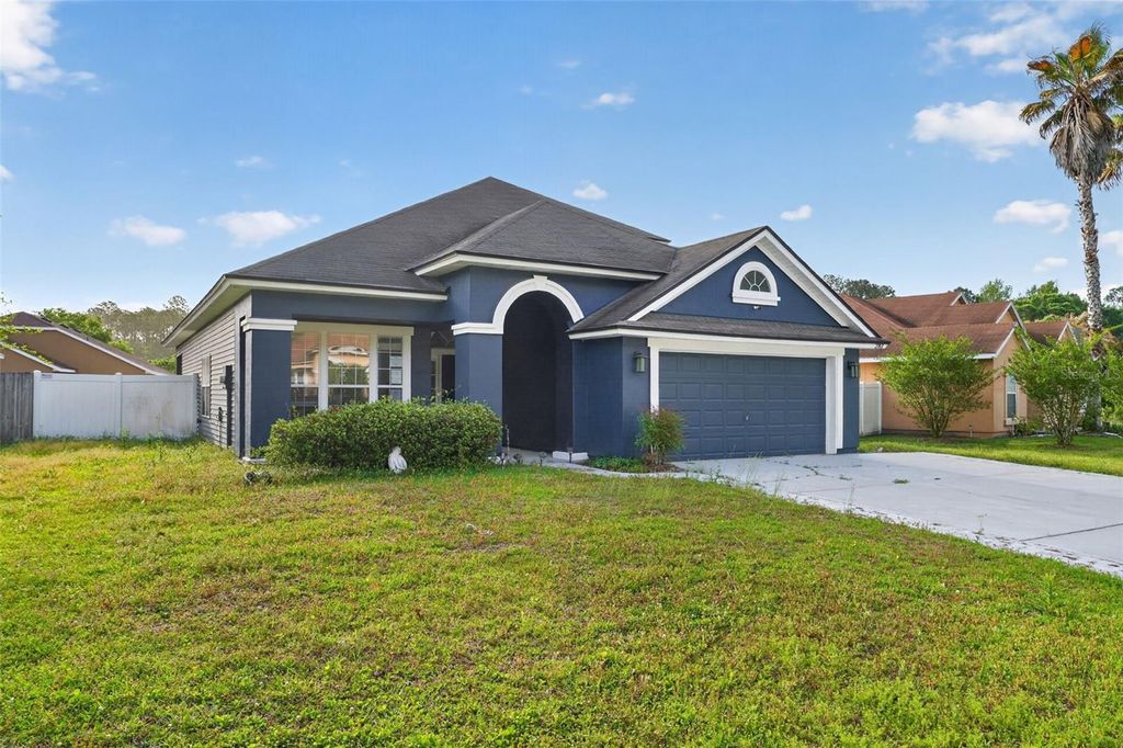 Photo of 2763 Wood Stork Trail, Orange Park, FL 32073 (MLS # C7525192)