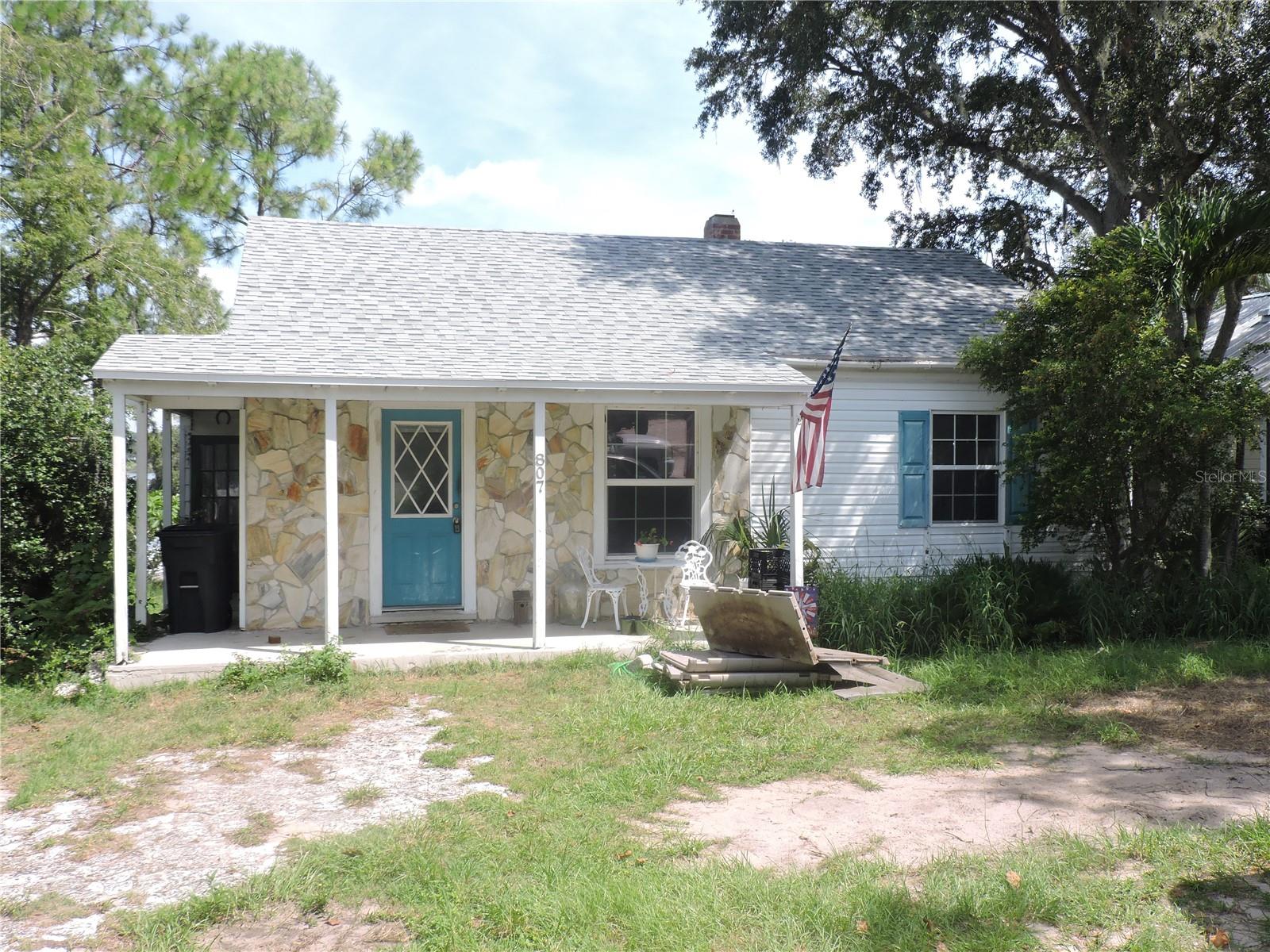 LOCATION, LOCATION, LOCATION.... WITH VIEWS OF LAKE WAILES LAKE THIS UNIQUE HOME IS ONE OF A KIND NEEDING SOME TLC. MAKE THIS A REAL TREASURE AS IT IS AN OPEN CANVAS FOR YOUR IMAGINATION AS TO WHAT YOU CAN DO. SITTING ON A LARGE LOT, THIS HOME HAS 2 BEDROOMS AND 1 BATH UPSTAIRS AND A BEDROOM AND BATHROOM DOWNSTAIRS. THERE IS SOME HARDWOOD, CARPET AND VINYL FLOORING. UPSTAIRS THERE IS AN OPEN LIVING AREA WITH A VAULTED CEILING IN THE LIVING ROOM. A SPACIOUS DINING ROOM AND KITCHEN AND A FAMILY ROOM WITH LOTS OF WINDOWS. IN THE BASEMENT DOWNSTAIRS, THERE IS A LAUNDRY AREA AND 2 OPEN ROOMS. DON'T DELAY, CALL TODAY TO PREVIEW THIS HOME WHICH IS PRICED TO SELL.