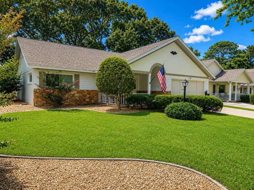 LUXUARY LIVING AT ON TOP OF THE WORLD 55+ COMMUNITY! Come see this beautiful Bostonian Villa on a corner lot! One of the most affordable properties in this community with NEWER ROOF 2022, NEW A/C 2026, FRESH EXTERIOR PAINT 2025, NEW WINDOWS 2025, INTERIOR PAINTED 2025, BOTH BATHROOMS HAVE NEW VANITIES AND TOILETS! NEW CHANDELIER. Large homesite with beautiful oak trees in the back yard, large screened lanai and an outdoor paver pad for your grill and patio furniture. This Villa comes with stone on the front, a beautiful maple tree and island landscaping with curbing in the front yard. This home is ready for it's next owner. The washing machine, stove and refrigerator are less than 5 years old. This is a maintenance free home with lawn care included in the HOA. You'll be tickled with the amount of storage in this home, the garage has shelving and an epoxy floor. Numerous heated pools, fitness centers and amenities at your disposal ALL INCLUDED with your HOA. NO CDD Bonds! This Villa is close to one of the three dog parks in the community and you will love the canopy of trees through this neighborhood. Excellent restaurant on property, a town square. Three golf courses and this is a golf cart community which provides access to three different shopping centers. More photos and video coming!