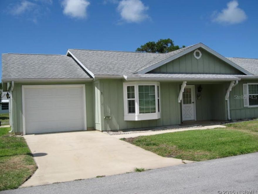 This spacious waterfront half duplex is the perfect winter retreat or year-round home. Youâll love the sunny eat-in kitchen. The comfortable living room and peaceful master bedroom both connect by sliders to the glorious 18-foot Florida room overlooking one of the prettiest ponds in Fairgreen. Watch the herons and egrets fish as the graceful willows sway. The Florida room is fully insulated, has heat and air-conditioning--and best of all a full array of thermopane windows to reveal the gorgeous scene. The house has a nifty garage with automatic door and a sweet laundry room with huge windows overlooking the pond. Fairgreen is a friendly and well-kept golf community. The low annual HOA fee includes lawn irrigation, termite bond, maintenance of common areas, and basic cable. Membership in the heated and immaculate Fairgreen pool is available separately to owners. Home comes with basic furnishings; the seller will remove stored items and select family pieces such that the home will be move-in ready. ;Water: City