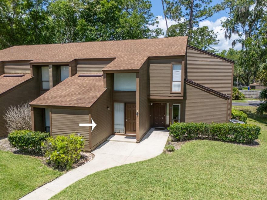 This stunning 2/2 condo is nestled in the tranquil Woodhaven community surrounded by lush, tree-lined streets that provide a serene atmosphere. Enjoy an open floor-plan, abundance of natural light and new stainless steel kitchen appliances. This unit boasts a fully screened-in back patio/Florida room overlooking the freshly updated community pool area. Despite its secluded feel, you'll find shopping and dining options conveniently nearby, including the Island Walk Shopping Center just a short walk away. This community has a well-established Homeowners Association that ensures top-notch care of the common areas. Enjoy amenities like a community clubhouse, community pool, tennis/pickleball courts and a sauna. With low HOA fees of just $435/month, you’ll benefit from water, lawn care, garbage pick-up, and outside maintenance, including roof care. Don’t miss your chance to see this beautiful property—schedule a showing today!