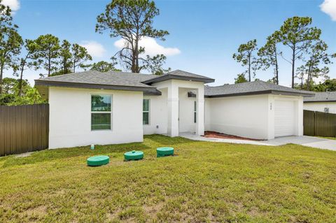 Photo of 2804 64th Street W, Lehigh Acres, FL 33971 (MLS # O6350764)