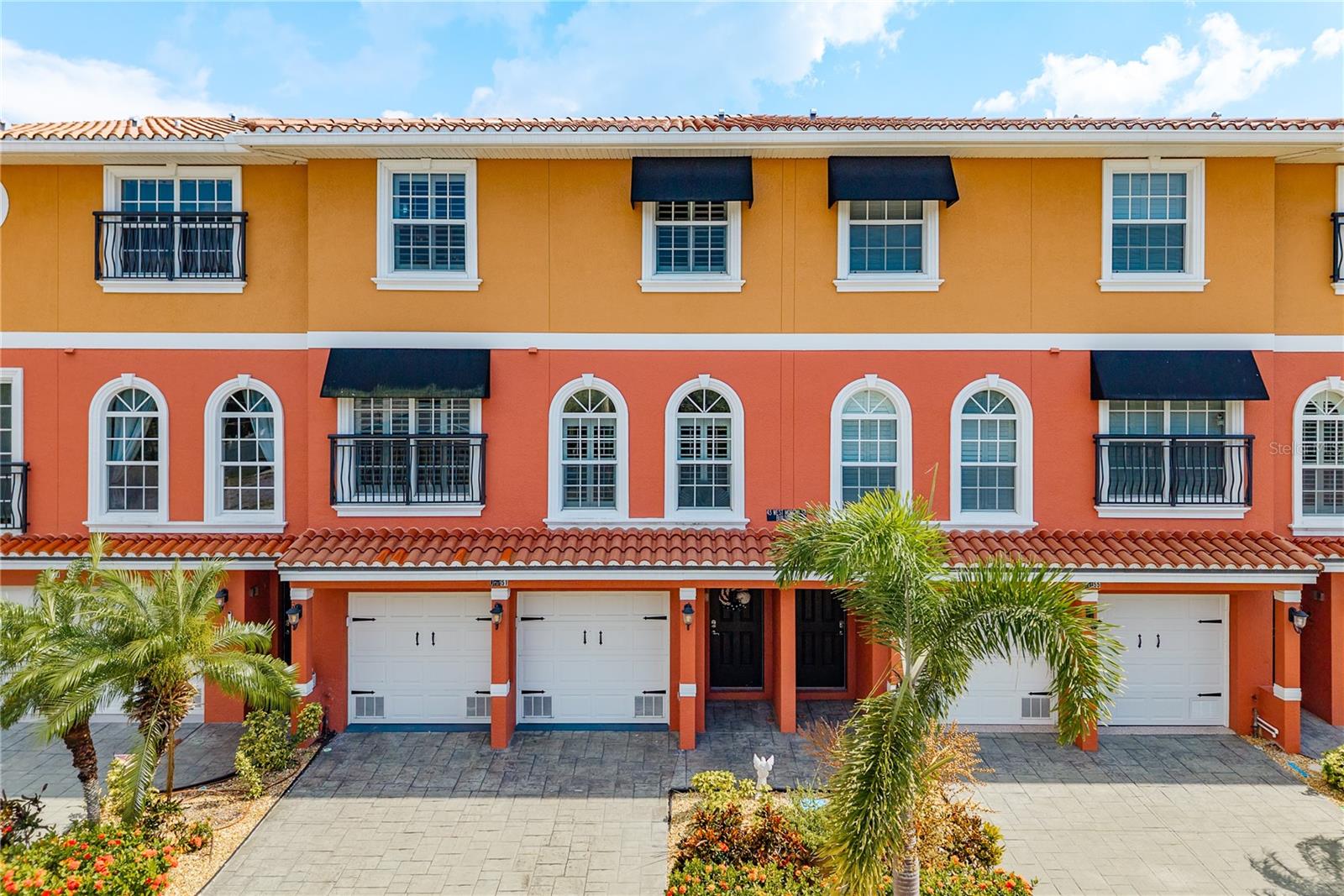 LUXURY Waterfront Living in the Heart of Tarpon Springs!!! Special Offer: Enjoy access to a preferred lender with exclusive great-rate financing, making your dream of Gulf-front luxury even more within reach. (BONUS: TWLIGHT PHOTS AND 3D TOUR COMING SOON!!)
Welcome to this stunning Mediterranean-style waterfront townhome offering the perfect blend of luxury, location, and lifestyle — complete with your own private dock and like-new 6,000 lb boat lift just steps from your back door. Enjoy boating access to the Gulf of Mexico within moments, making it easy to embrace the Florida waterfront lifestyle.
Located in a prime walkable location, you're just minutes from downtown Tarpon Springs, where breweries, bars, restaurants, boutique shops, and the World Sponge Docks await. Plus, the PINELLAS TRAIL is only steps from your front door, inviting you to explore the area by bike or foot with ease.
Built in 2008 with SOLID BLOCK CONSTRUCTION ALL THE WAY TO THE TOP, impact windows, and a beautiful barrel tile roof, this home is as strong as it is stunning. Inside, you'll find over 2,500 square feet of elegantly upgraded living space, featuring:
* Gorgeous MARBLE COUNTERTOPS!
* Custom SOLID WOOD CABINETRY, TALL TRIM, TALL SOLID CORE WOOD DOORS THROUGHOUT!
* A PRIVATE ELEVATOR!
* Dual balconies with tropical, tranquil water views!
* A spacious CUSTOM PAVERED PATIO — perfect for grilling today’s fresh catch and entertaining waterside!
* A **4-car tandem garage** with ADDED ELEVATED STORAGE!
* BEAUTIFUL PLANTATION SHUTTERS and MOTORIZED SHADES that elevate privacy and create the perfect movie-night ambiance!
* Perfectly tinted master bedroom windows on the top floor to reduce glare and enhance comfort without sacrificing views!
* Conveniently located office space, generously sized to double as a guest retreat — even large enough to add a MURPHY BED for the many visitors who will want to be close to all the amazing things Tarpon Springs has to offer!
This rare, ORIGINAL OWNER HOME has been meticulously maintained and is move-in ready for your next chapter of waterfront living. As a bonus, it includes a **13-month Choice Home Warranty ULTIMATE Plan** for complete peace of mind.
And if you're dreaming of a **third bedroom or even a third bath**, just ask! I’ll show you how easy it is to make it happen!
Whether you're a boating enthusiast, foodie, or just love the charm of coastal living, **this is your opportunity to own one of Tarpon Springs' most coveted waterfront townhomes**.
**Schedule your private showing today!**