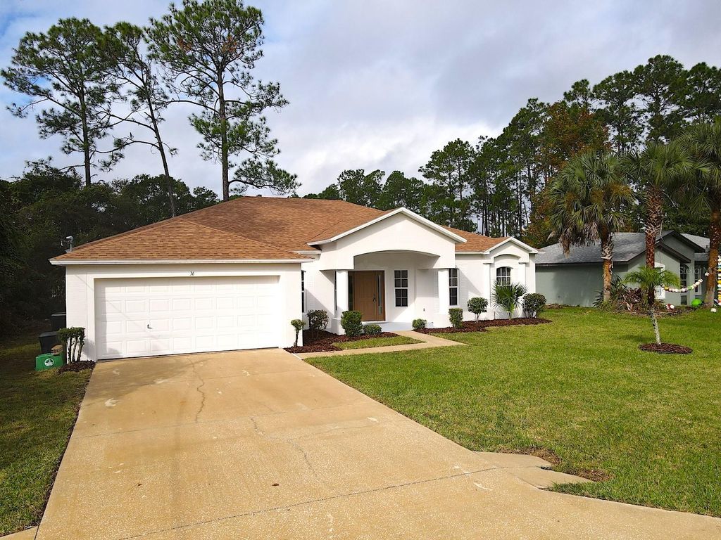 Photo of 36 Ripplewood Lane, Palm Coast, FL 32164 (MLS # FC313701)