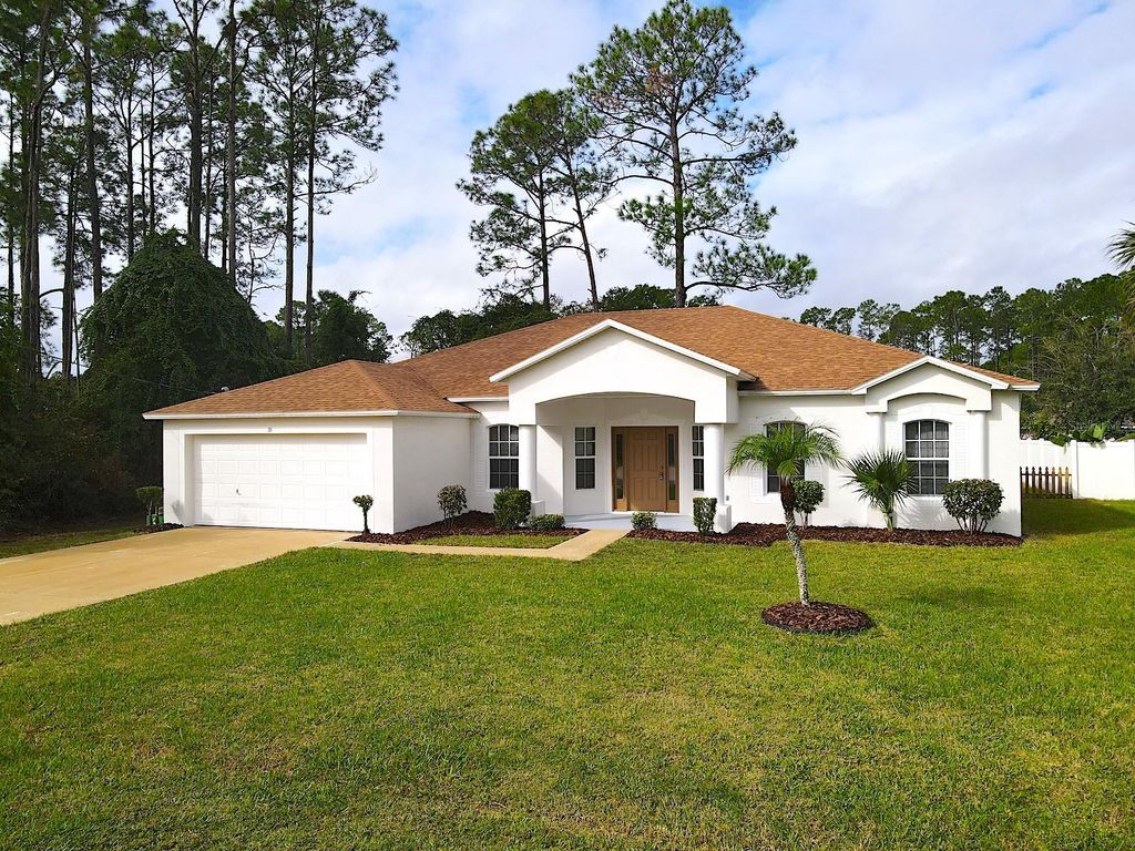 Photo of 36 Ripplewood Lane, Palm Coast, FL 32164 (MLS # FC313701)