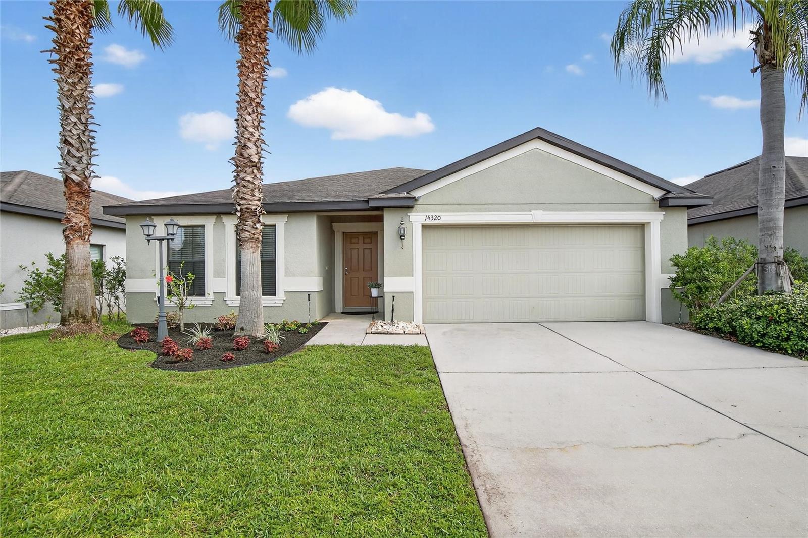 Beautifully Maintained 3-Bedroom Home with Upgrades & Resort Style Amenities! Welcome to this stunning single-story home offering 3 bedrooms, 2 bathrooms and an open floor plan designed for both comfort and entertaining. From the moment you step inside, you'll be greeted by a long entry hallway leading into spacious living areas with diagonally laid ceramic tile flooring throughout the main spaces. The heart of the home is the chef's kitchen, featuring a large center island with extended breakfast bar, granite countertops, stainless steel appliances and professional lighting. An eat-in breakfast area flows seamlessly into the dining room and great room, creating the perfect space for gatherings. The private owner's suite offers a peaceful retreat with a dual vanity, custom California closet-built ins, private water closet, and a stand-up tiled shower. Two additional spacious bedrooms, a guest bathroom with an extended vanity and shower/tub combo provide all the......... Don't miss the versatile office with double glass French doors, provide plenty of room for work and relaxation. Step outside to your own Florida oasis! A screen and extended lanai (23ft x 23ft) with a covered patio area, hot tub and professionally landscaped yard with mature palm trees makes outdoor living a dream. A 6-ft white vinyl privacy fence ensures peace and seclusion. Additional highlights include separate utility room with washer and dryer, garage with built-in cabinetry and epoxy floor, ceiling fans and blinds throughout, hurricane shutters for all windows. Located in a desirable community with fantastic amenities, including a clubhouse, pool, fitness center, playground, basketball court and dog park. Conveniently located near I-75 and US-301 providing easy access to Tampa Internation Airport, MacDill AFB, VA Hospital, St. Joseph's Hospital, shopping, dining, medical facilities and Florida's world-famous beaches - all less than an hour away. This move-in ready home combines thoughtful upgrades with an unbeatable location. Don't miss your chance to own it - schedule your private showing today!