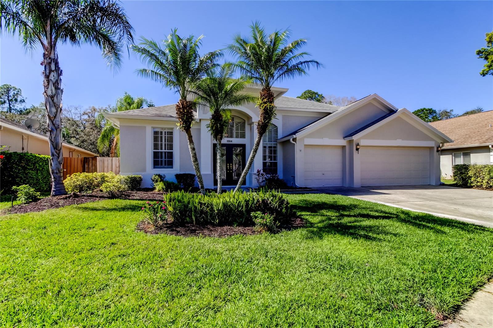 FRESHLY REMODELED 4/3/3 on a great lot with a beautiful new kitchen and bathrooms! INCREDIBLE OPPORTUNITY to own in Keswick Forest where homes typically sell for upwards of $800,000! This fantastic Westchase POOL home is perfectly situated on a quiet cul-de-sac. BRAND NEW WHITE SHAKER CABINETS and QUARTZ COUNTERTOPS in the kitchen and all three bathrooms! The primary bathroom is a spa-like delight with gorgeous tile, a free standing tub and an all new shower! Freshly painted inside and out! This home features high ceilings with lots of natural light and neutral colors throughout. The main rooms feature engineered wood floors and the lighting fixtures and fans have been updated in many rooms. Stainless steel appliances, 3 car garage with extensive cabinets for storage. New AC in 2020, new roof in 2014. The pool and lanai are private with a fully fenced and deep backyard. Enjoy the Westchase lifestyle complete with golf, tennis, pickleball, basketball, parks, playgrounds and more. The neighborhood offers so many conveniences with many restaurants and shops located within the community. Come experience the Westchase lifestyle which has long been rated one of the best in the entire Tampa Bay area.